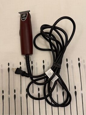 Oster T-Finisher Trimmer in burgundy,designed for professional trimming